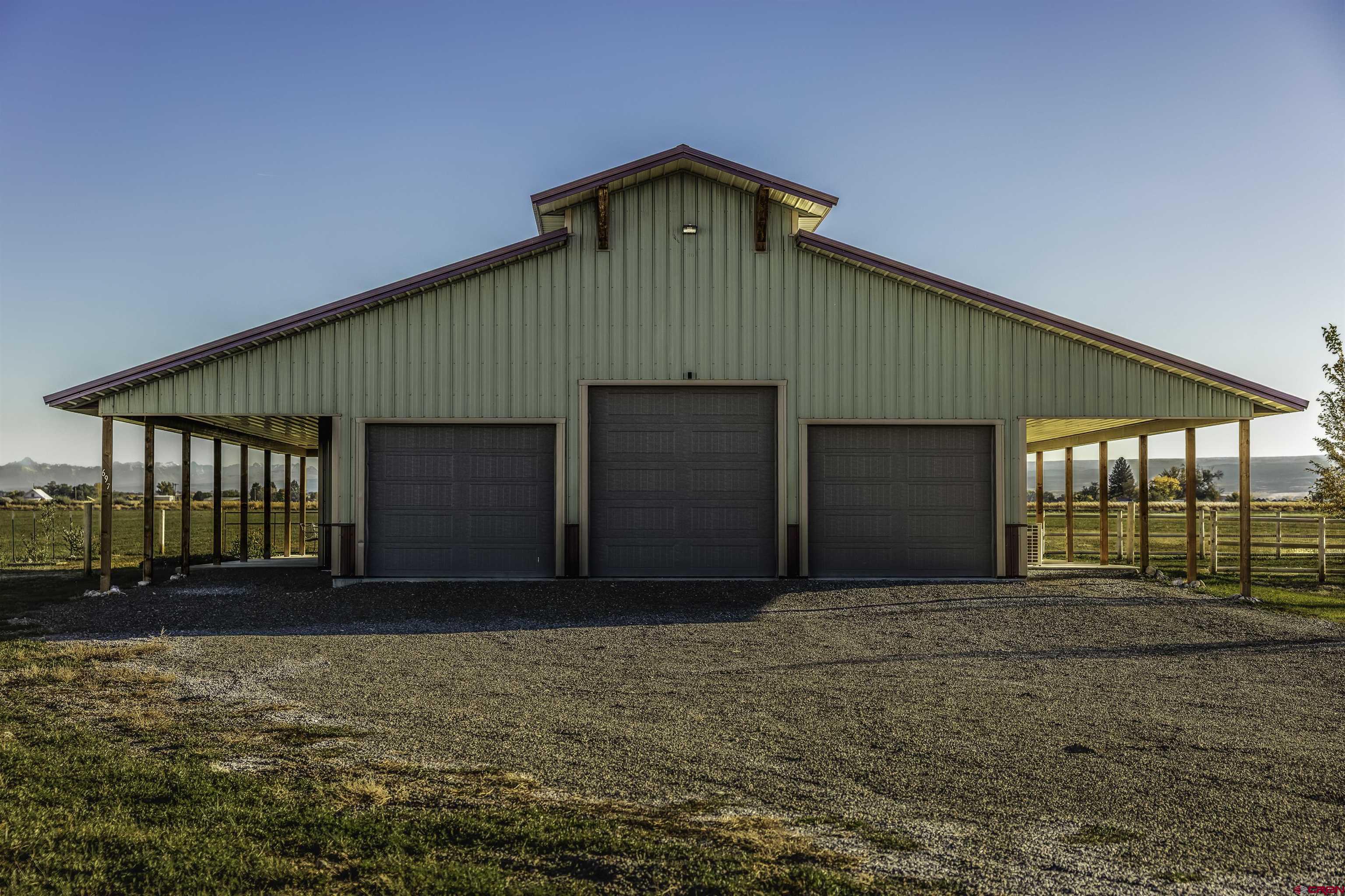 697 Grand Vista Road Delta, CO 81416 - Photo 2 of 44 a front view of a house