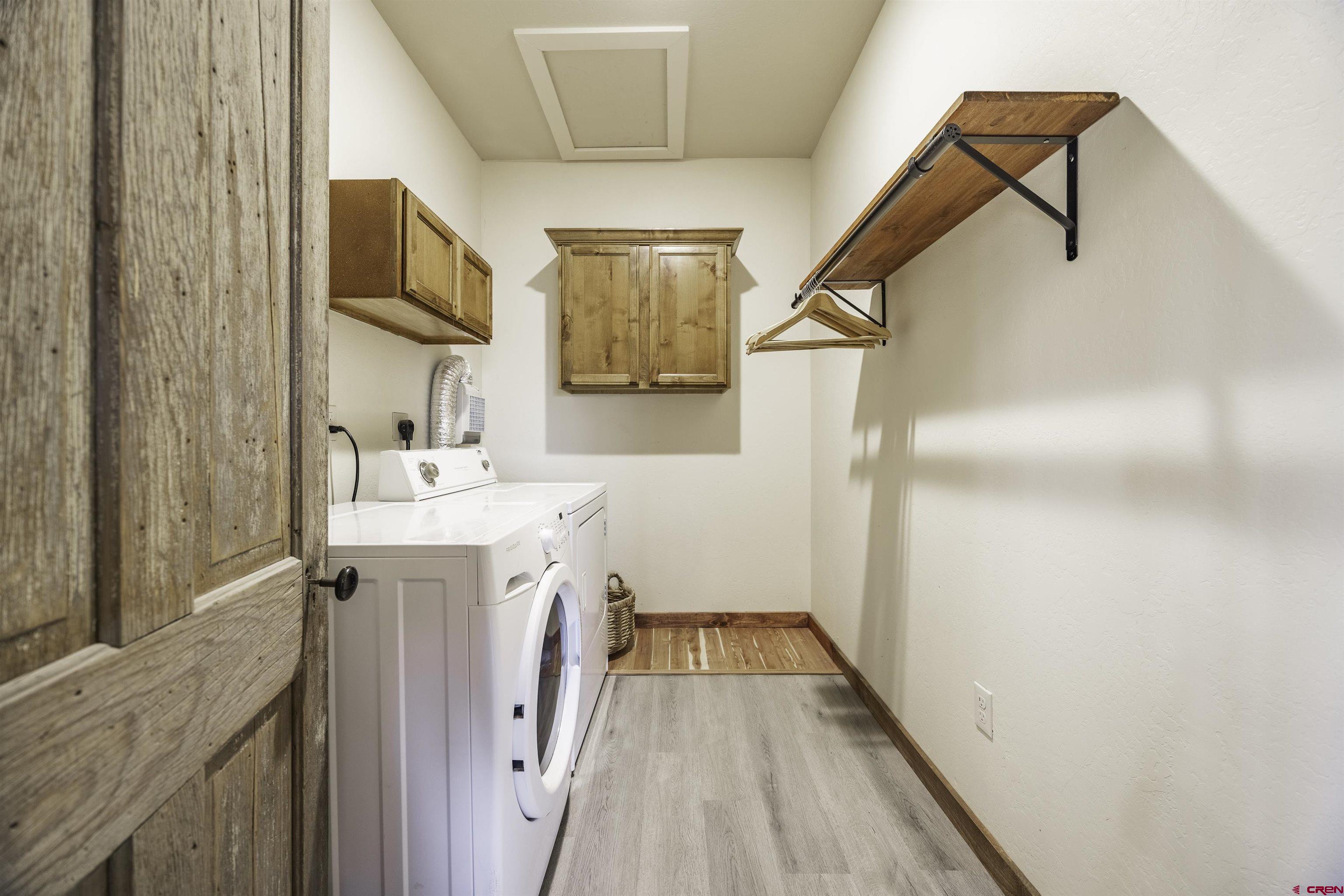 697 Grand Vista Road Delta, CO 81416 - Photo 22 of 44 a bathroom with a sink a mirror and a shower