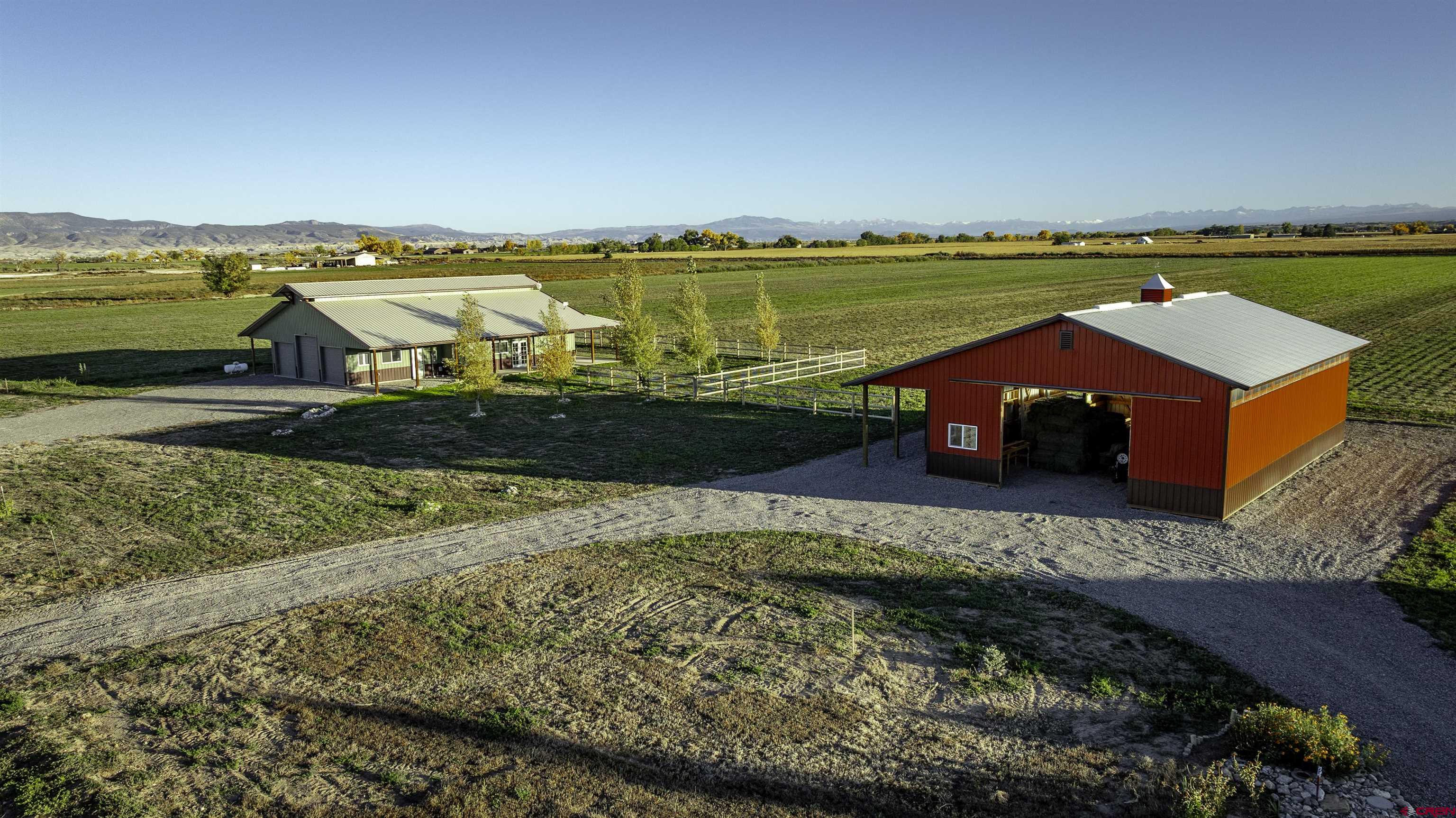 697 Grand Vista Road Delta, CO 81416 - Photo 33 of 44 a view of a city and ocean view