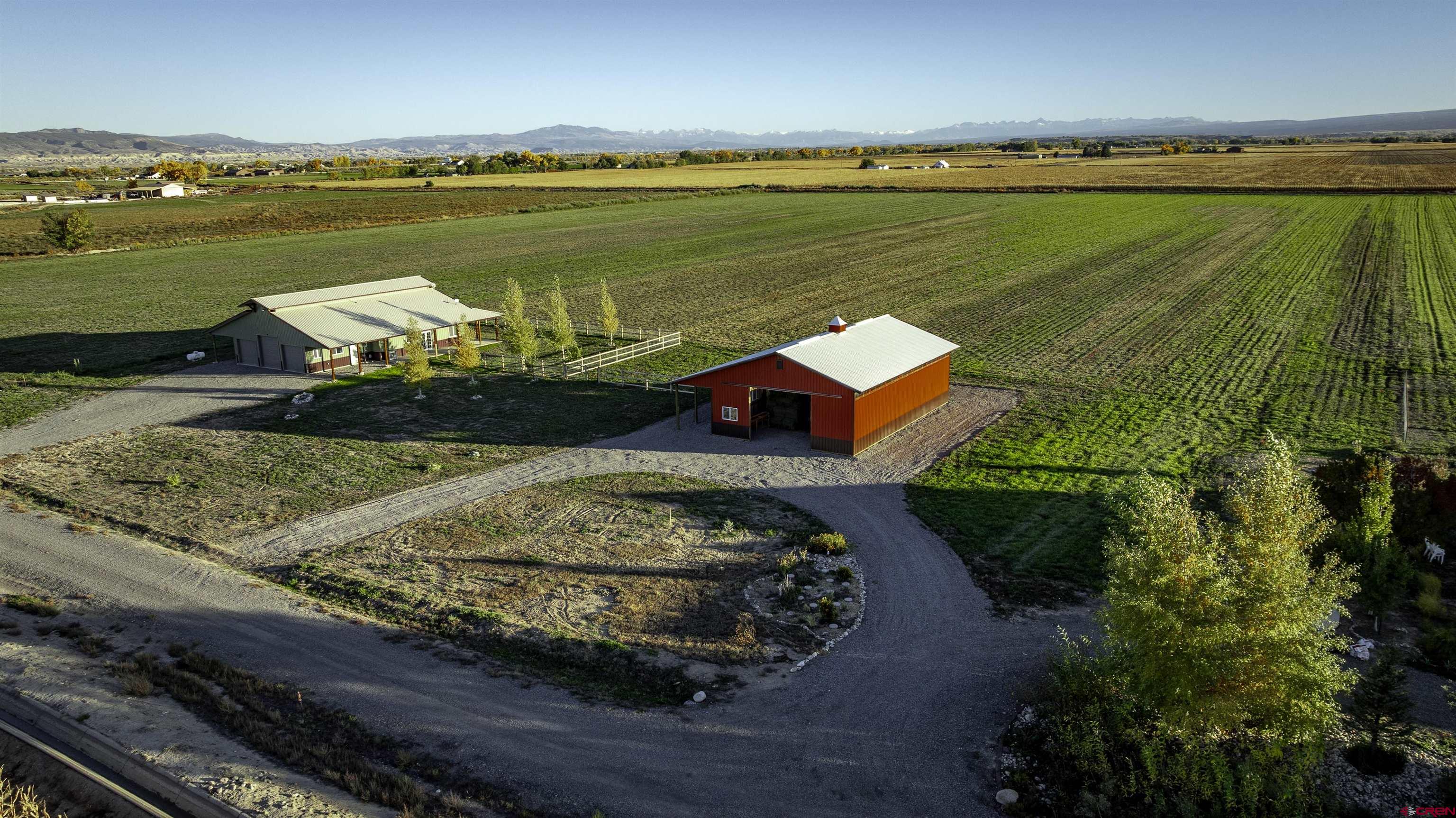 697 Grand Vista Road Delta, CO 81416 - Photo 35 of 44 a view of a city and an ocean