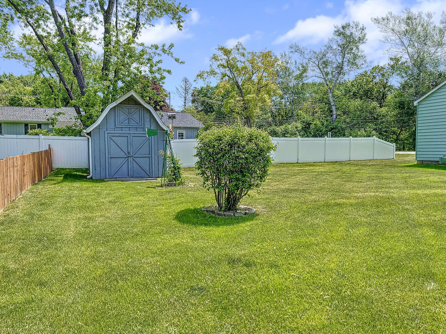 841 Rinear Road Antioch, IL 60002 - Photo 19 of 20 a view of a backyard with a small cabin