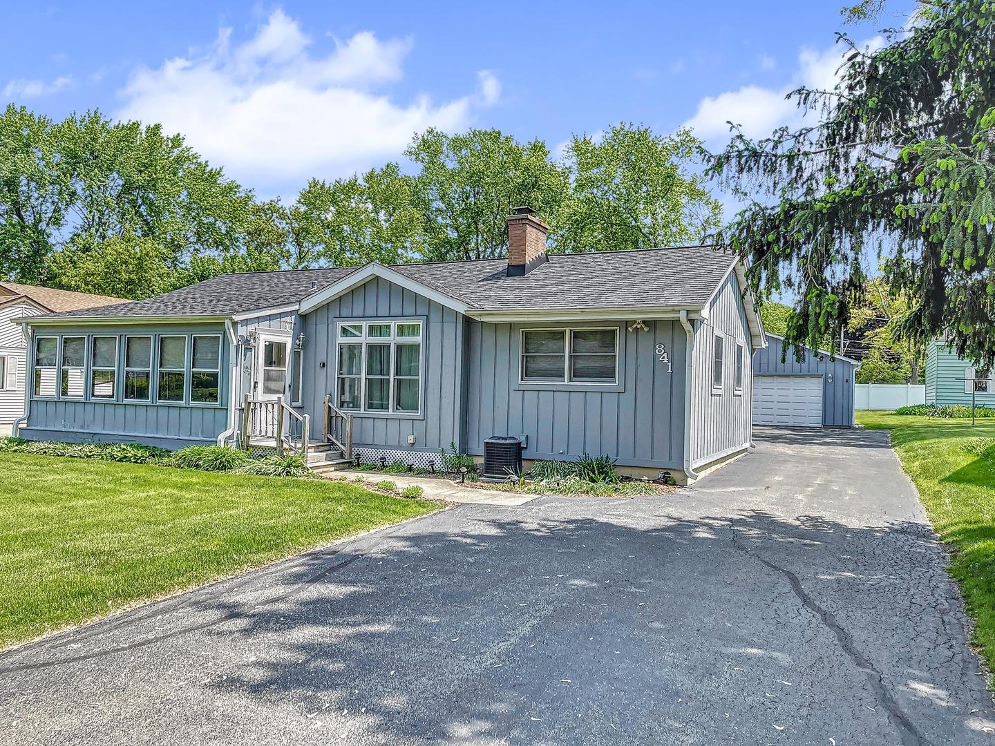 841 Rinear Road Antioch, IL 60002 - Photo 2 of 20 a front view of a house with a yard and garage