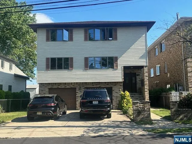 a car parked in front of a house