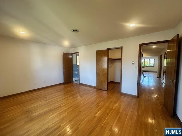 124 Johnson Avenue, Unit 2 Wallington, NJ 07057 - Photo 11 of 17 a view of empty room with wooden floor