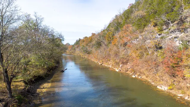 a view of an ocean with a mountain