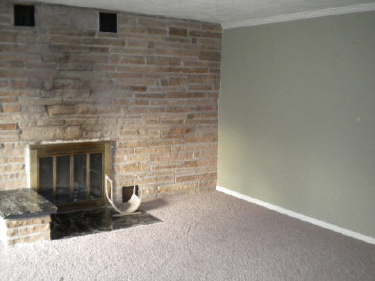 2388 McFarland Road Rockford, IL 61108 - Photo 2 of 6 a room with a fireplace