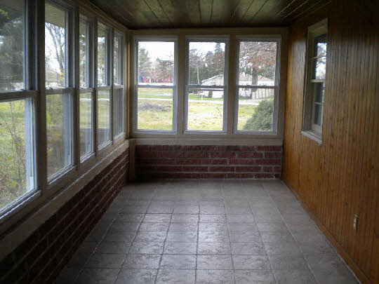 2388 McFarland Road Rockford, IL 61108 - Photo 6 of 6 a view of a room with wooden floor and windows