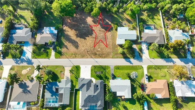 an aerial view of city and lake