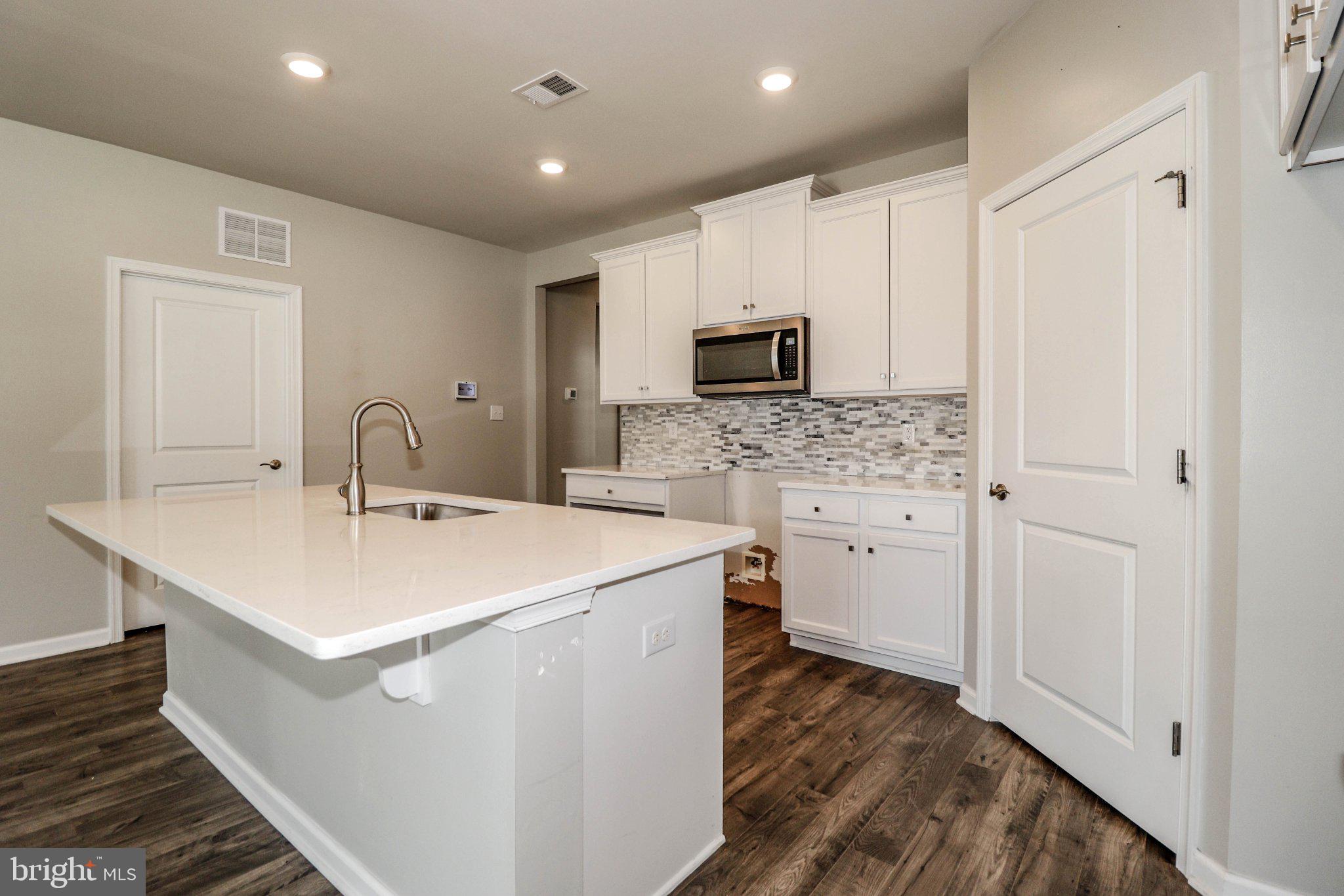 5 Preston Lane Delanco, NJ 08075 - Photo 15 of 45 Modern kitchen with sleek finishes.