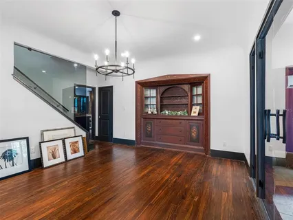a kitchen with a stove sink and refrigerator
