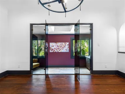 a bathroom with a shower sink and mirror