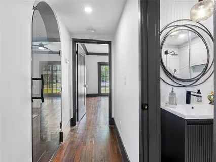 a view of a hallway with washer and dryer