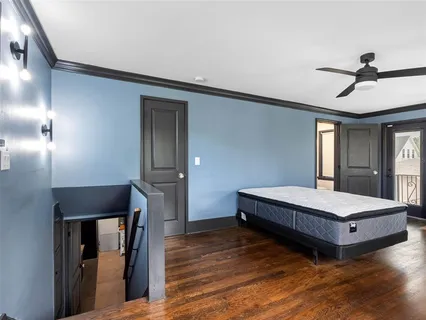 an aerial view of a house with a garden