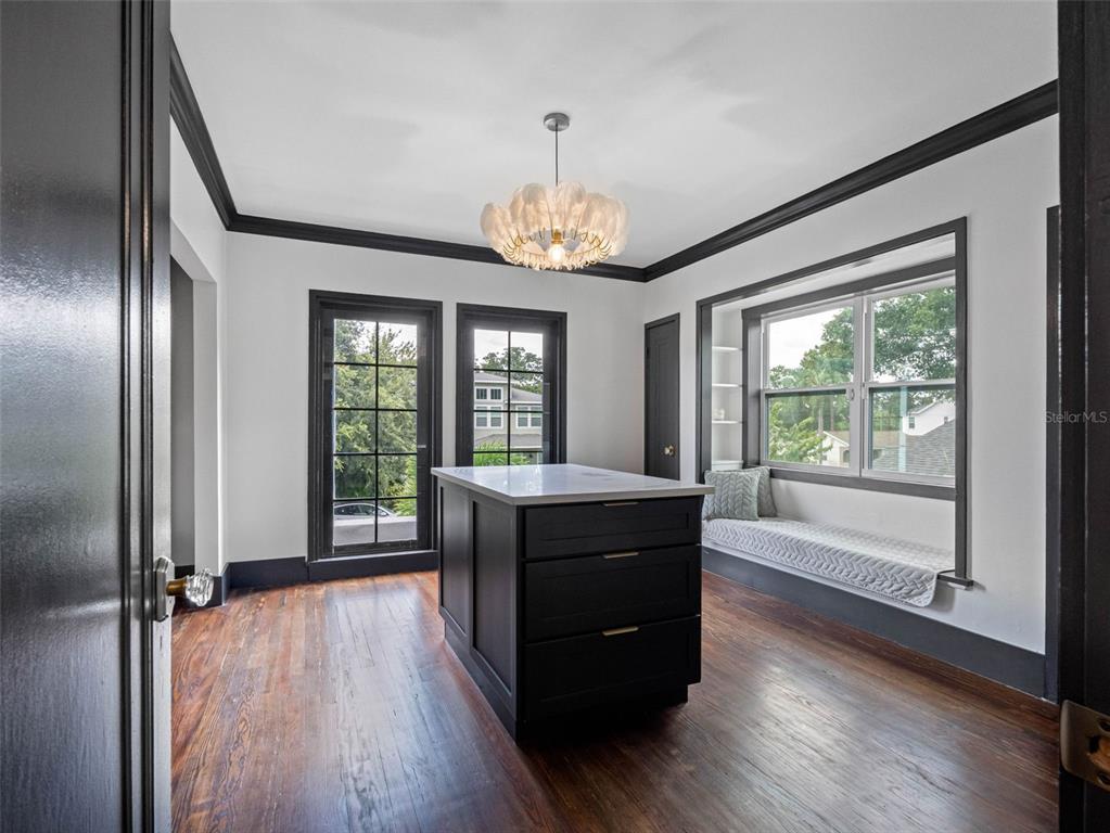 1570 48th Avenue North St. Petersburg, FL 33703 - Photo 46 of 75 a living room with a large window