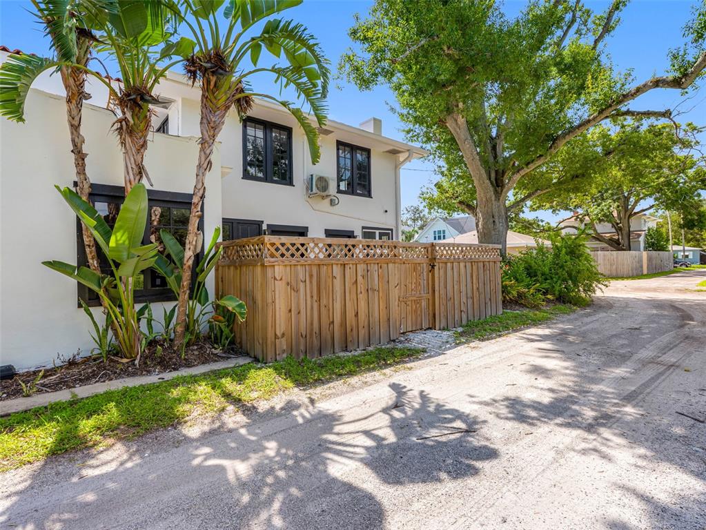 1570 48th Avenue North St. Petersburg, FL 33703 - Photo 58 of 75 a front view of a house with a yard
