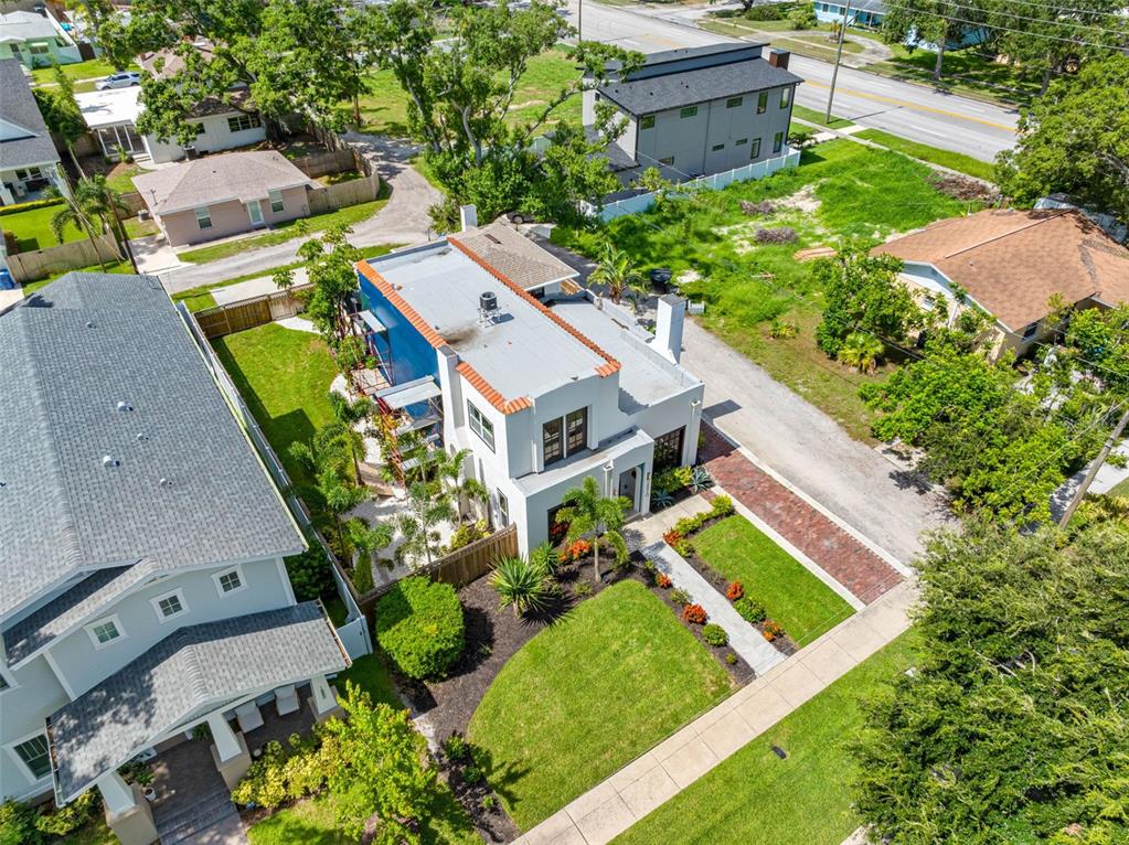 1570 48th Avenue North St. Petersburg, FL 33703 - Photo 59 of 75 an aerial view of a house with a garden and plants