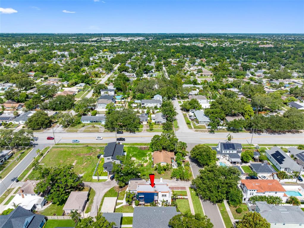 1570 48th Avenue North St. Petersburg, FL 33703 - Photo 68 of 75 an aerial view of residential houses with outdoor space