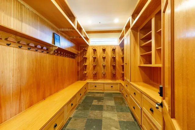 a bathroom with a sink and a window