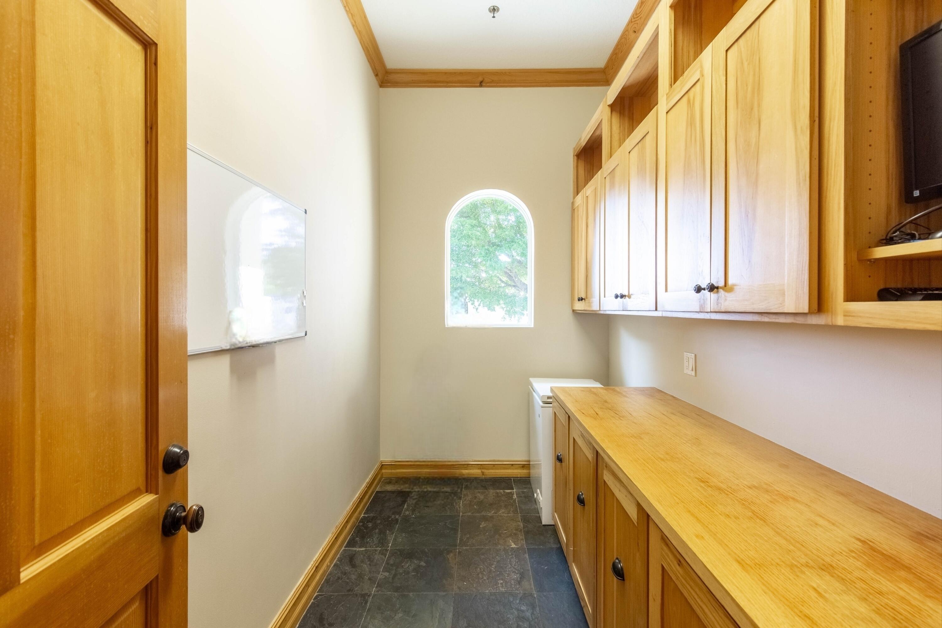 14943 Paddock Drive, Unit STALLS AND ) Wellington, FL 33414 - Photo 19 of 41 a bathroom with a sink and a window
