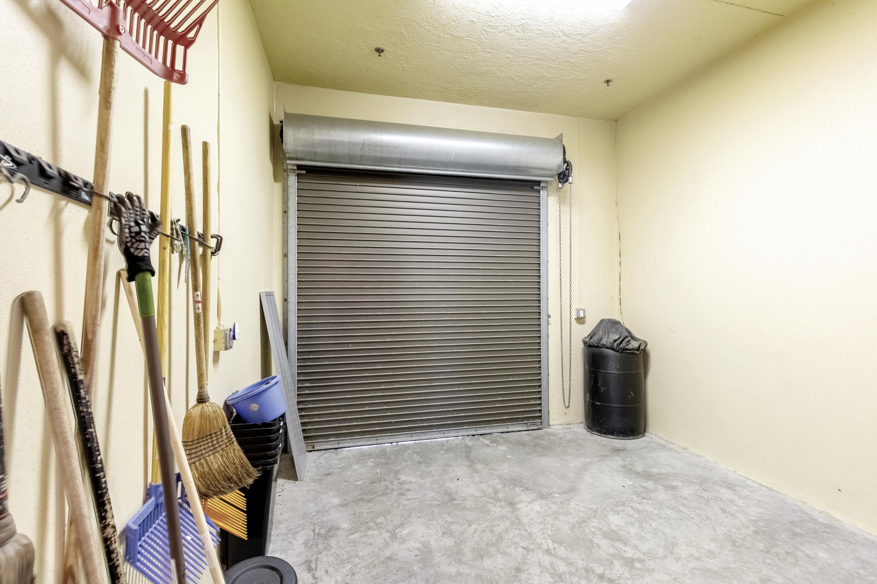 14943 Paddock Drive, Unit STALLS AND ) Wellington, FL 33414 - Photo 40 of 41 a view of a room with gym equipment