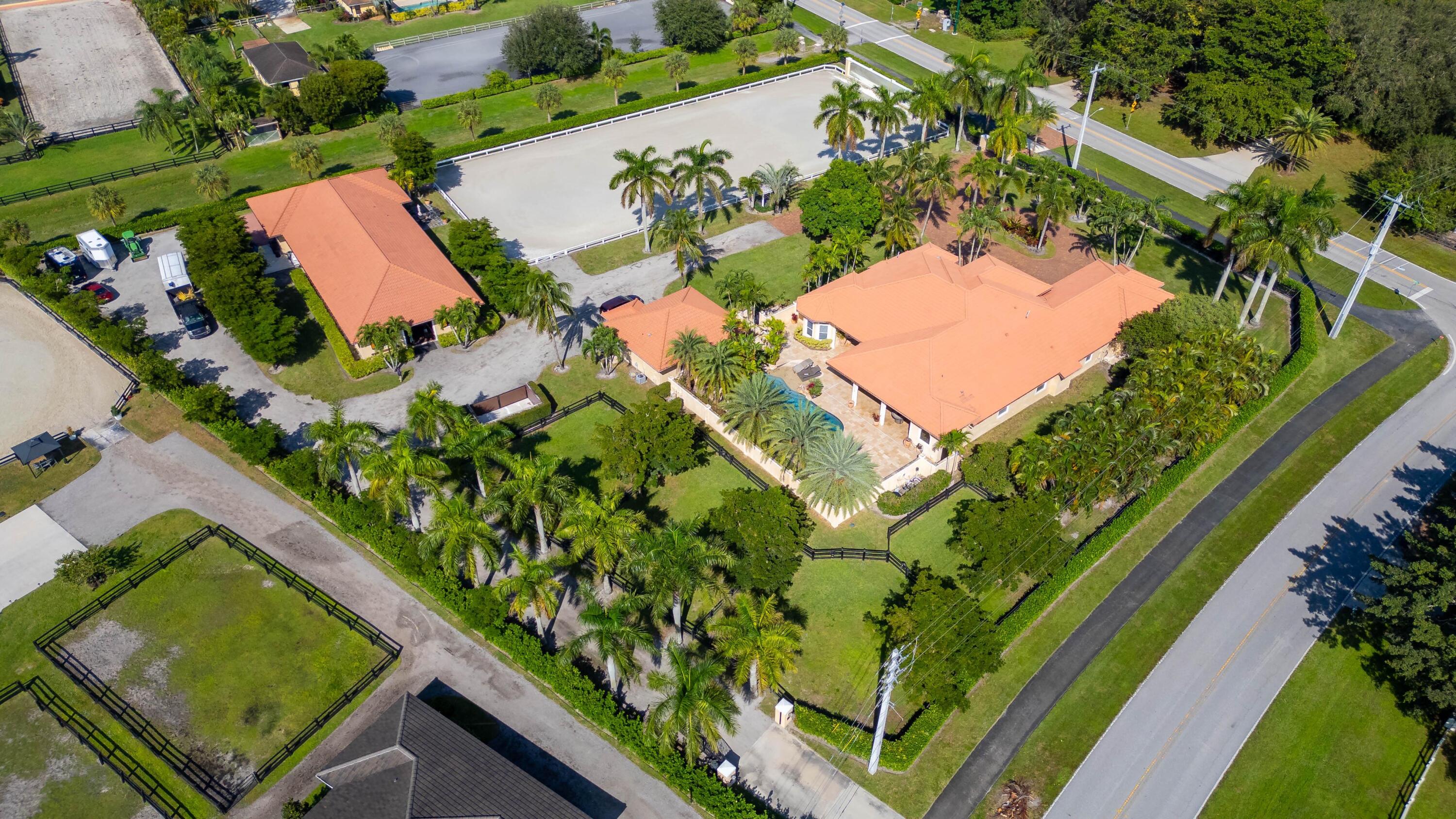 14943 Paddock Drive, Unit STALLS AND ) Wellington, FL 33414 - Photo 6 of 41 an aerial view of a house