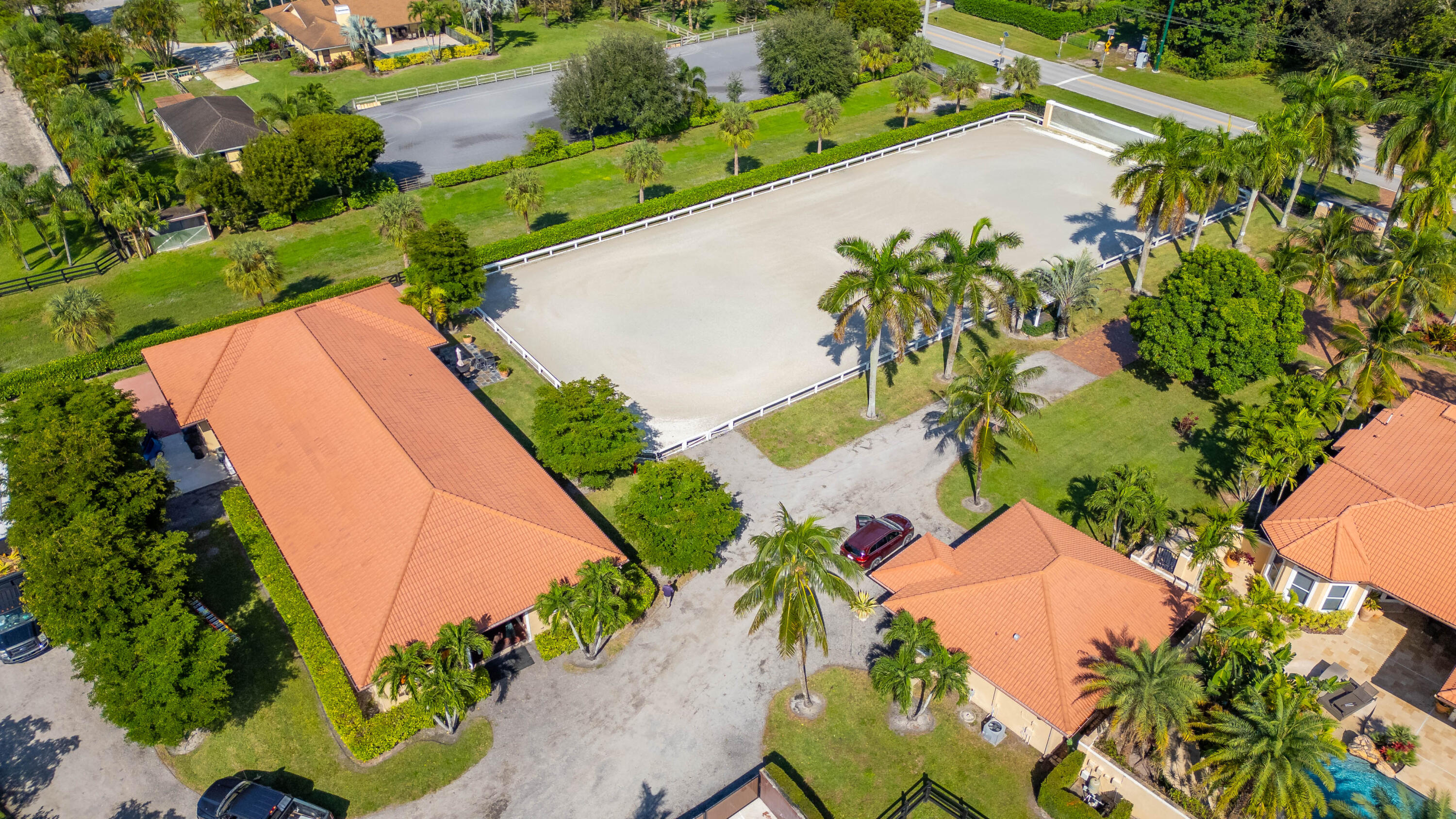 14943 Paddock Drive, Unit STALLS AND ) Wellington, FL 33414 - Photo 8 of 41 an aerial view of a house