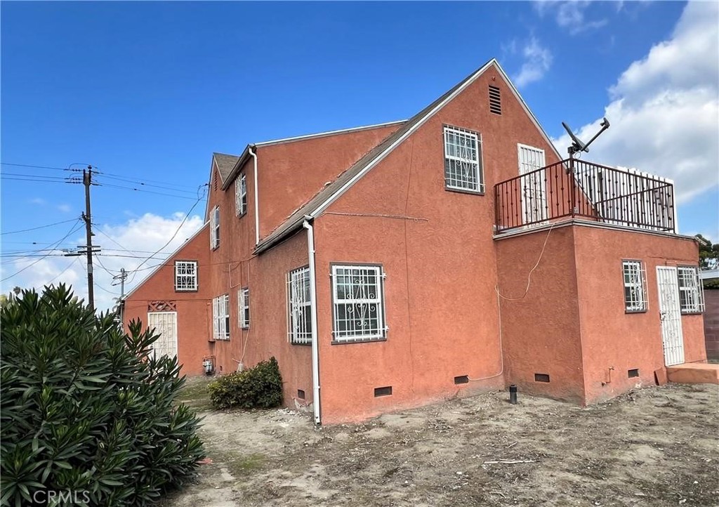 332 West Laurel Street Compton, CA 90220 - Photo 1 of 3 a view of a house with a yard