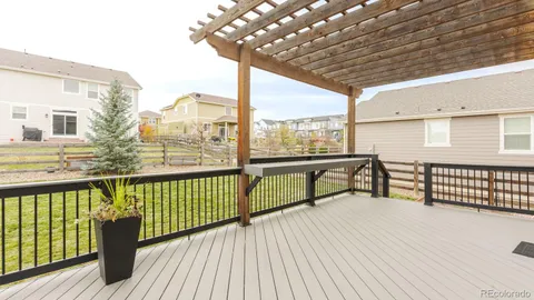 a view of balcony with furniture
