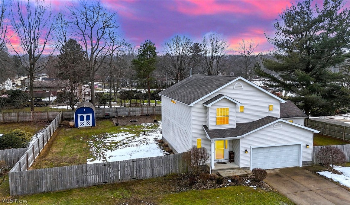 3880 Selnik Road Kent, OH 44240 - Photo 2 of 46 *FRONT WEST SIDE VIEW OF SHED AND FENCED IN BACK YARD ~
