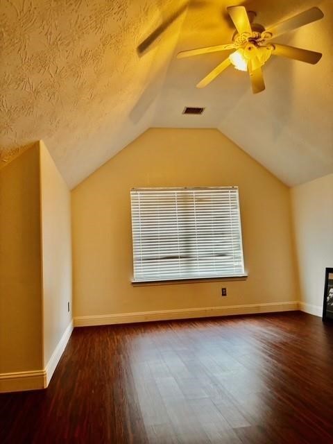 23915 Floragate Drive Spring, TX 77373 - Photo 16 of 25 a view of an empty room with wooden floor and a window