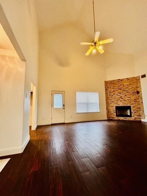 23915 Floragate Drive Spring, TX 77373 - Photo 18 of 25 a view of a livingroom with wooden floor and a ceiling fan