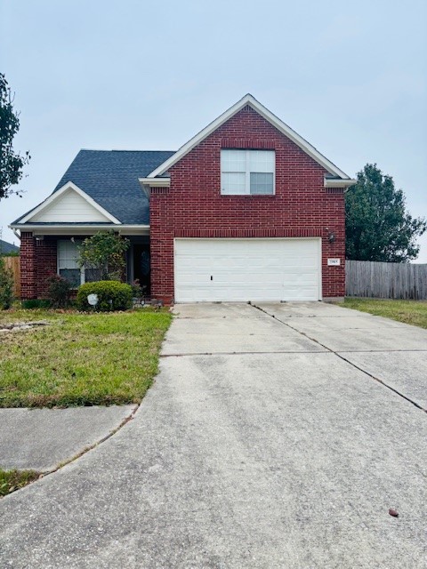 23915 Floragate Drive Spring, TX 77373 - Photo 25 of 25 a front view of a house with a yard