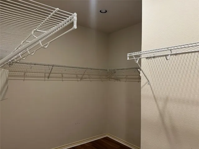 a view of a room with racks on the wall