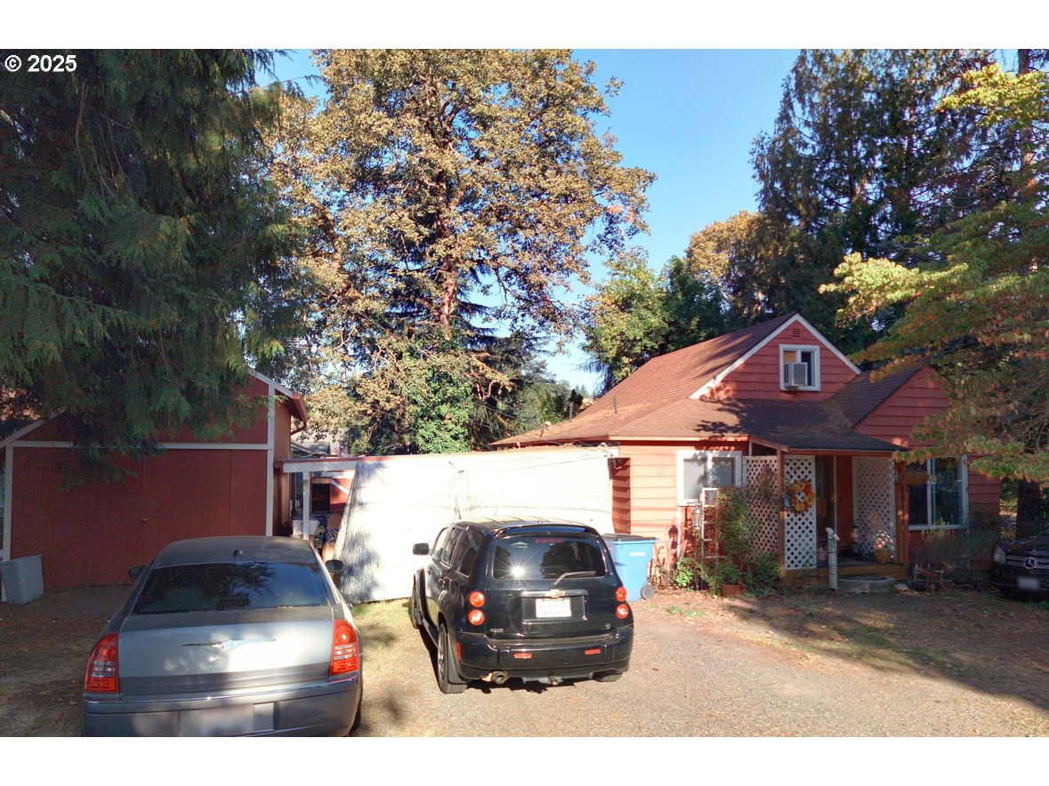 a car parked in front of a house