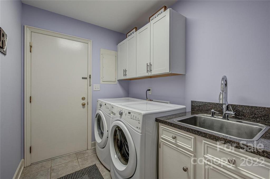 1909 3 Lakes Road Shelby, NC 28150 - Photo 19 of 48 a utility room with sink dryer and washer