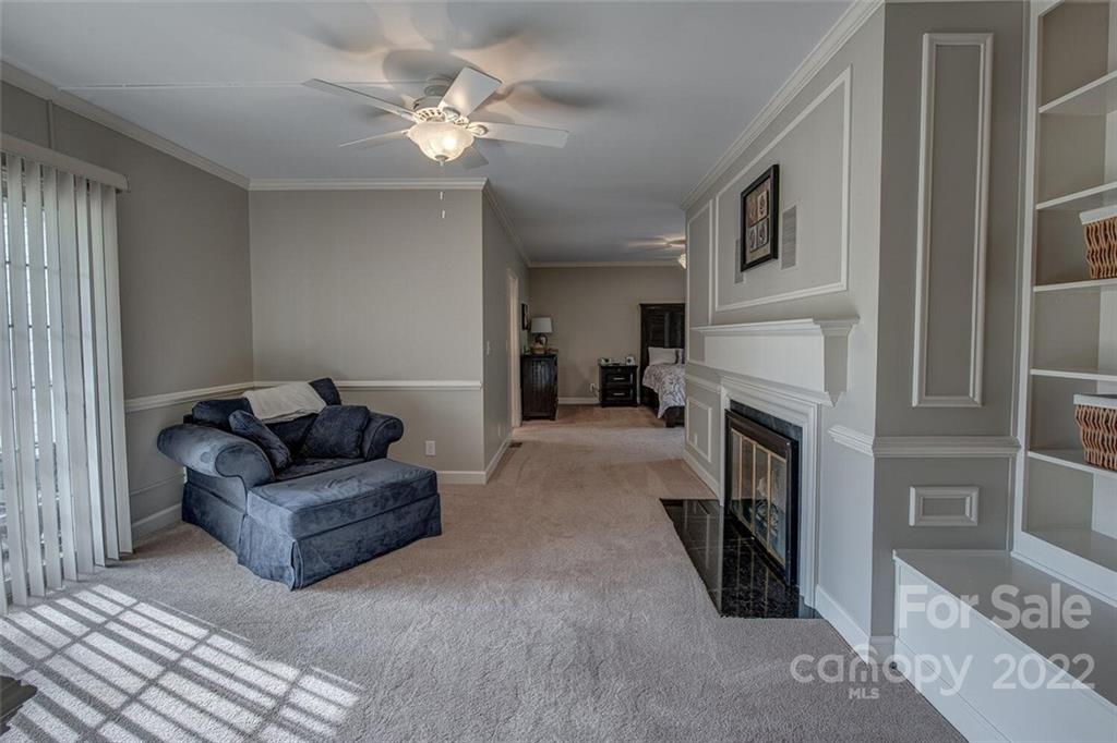 1909 3 Lakes Road Shelby, NC 28150 - Photo 20 of 48 a living room with furniture and a fireplace