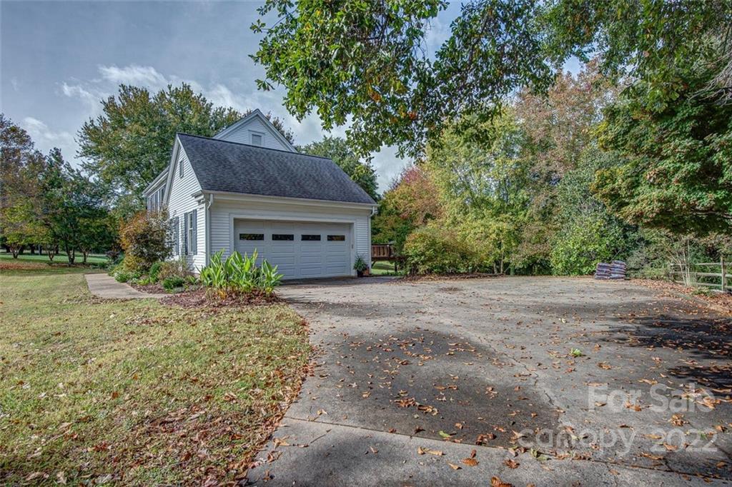 1909 3 Lakes Road Shelby, NC 28150 - Photo 40 of 48 a house view with a garden space