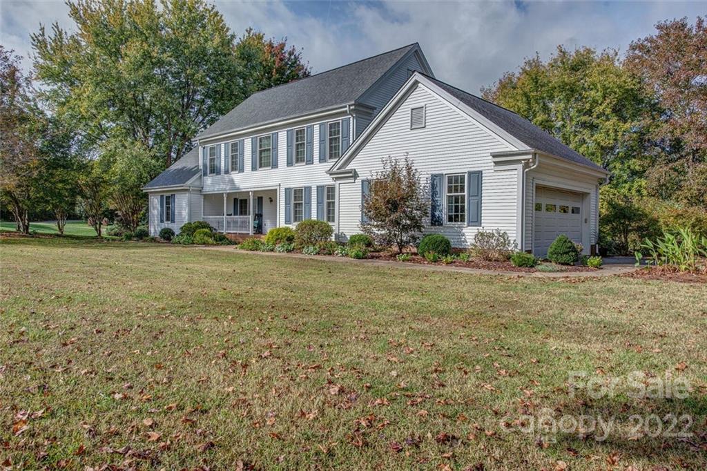 1909 3 Lakes Road Shelby, NC 28150 - Photo 4 of 48 a front view of a house with garden