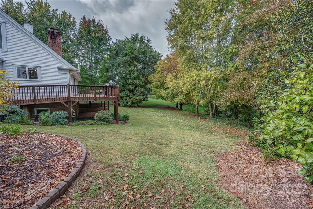 1909 3 Lakes Road Shelby, NC 28150 - Photo 41 of 48 a view of a house with yard and a tree