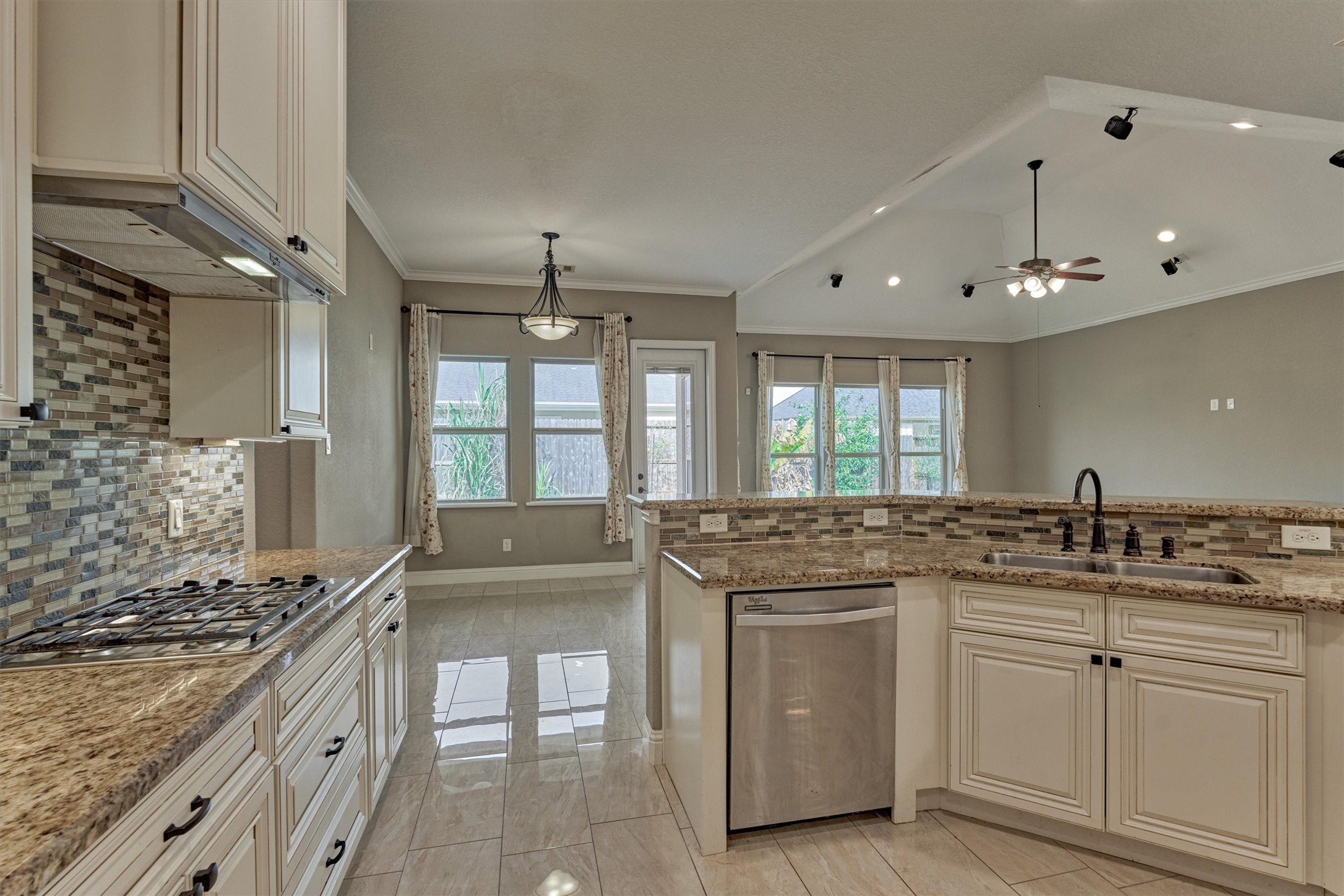 106 Bella Luce Shenandoah, TX 77381 - Photo 29 of 47 a kitchen with white cabinets and appliances