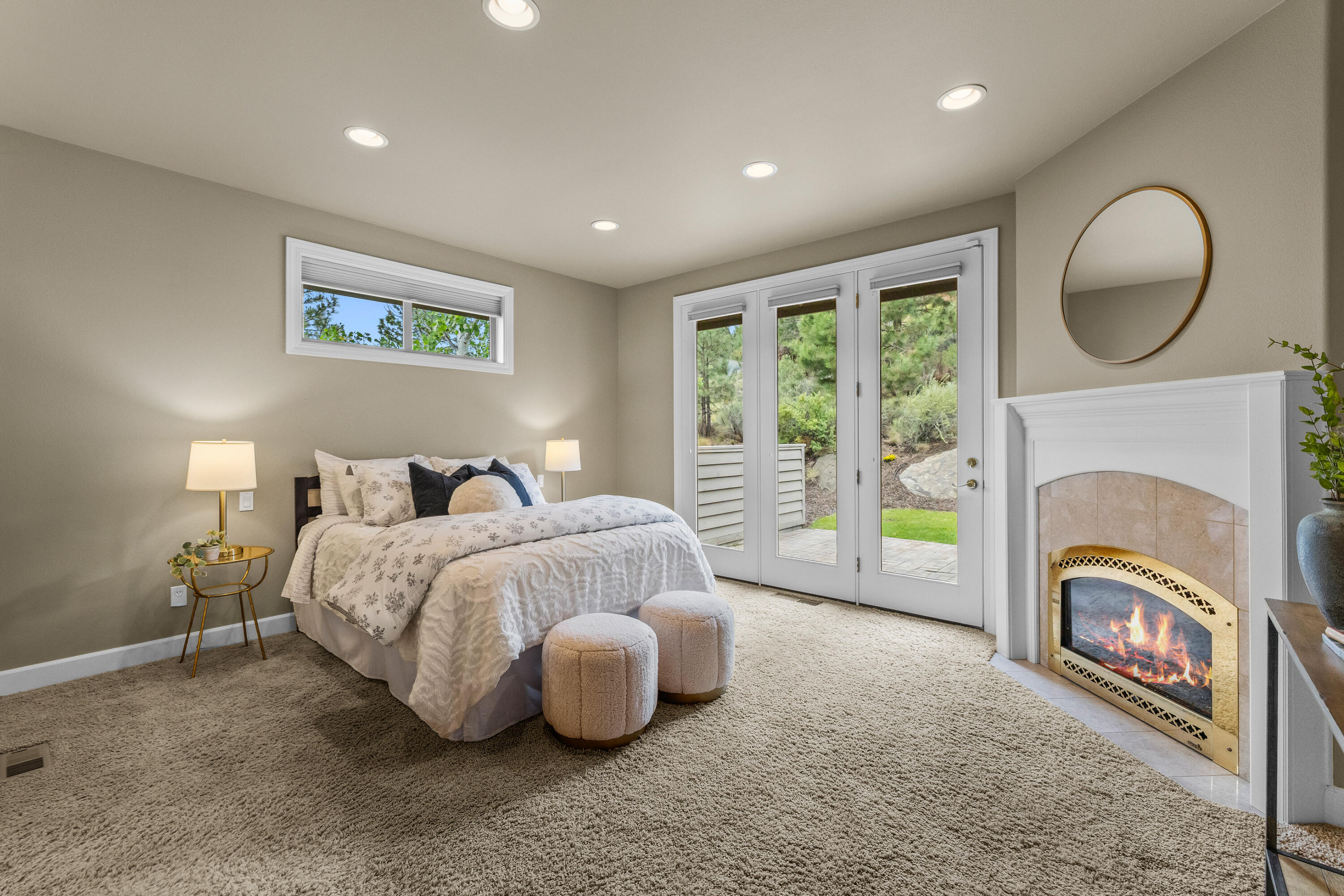 19598 Green Lakes Loop Bend, OR 97702 - Photo 27 of 89 a spacious bedroom with a bed painting on wall and a large window