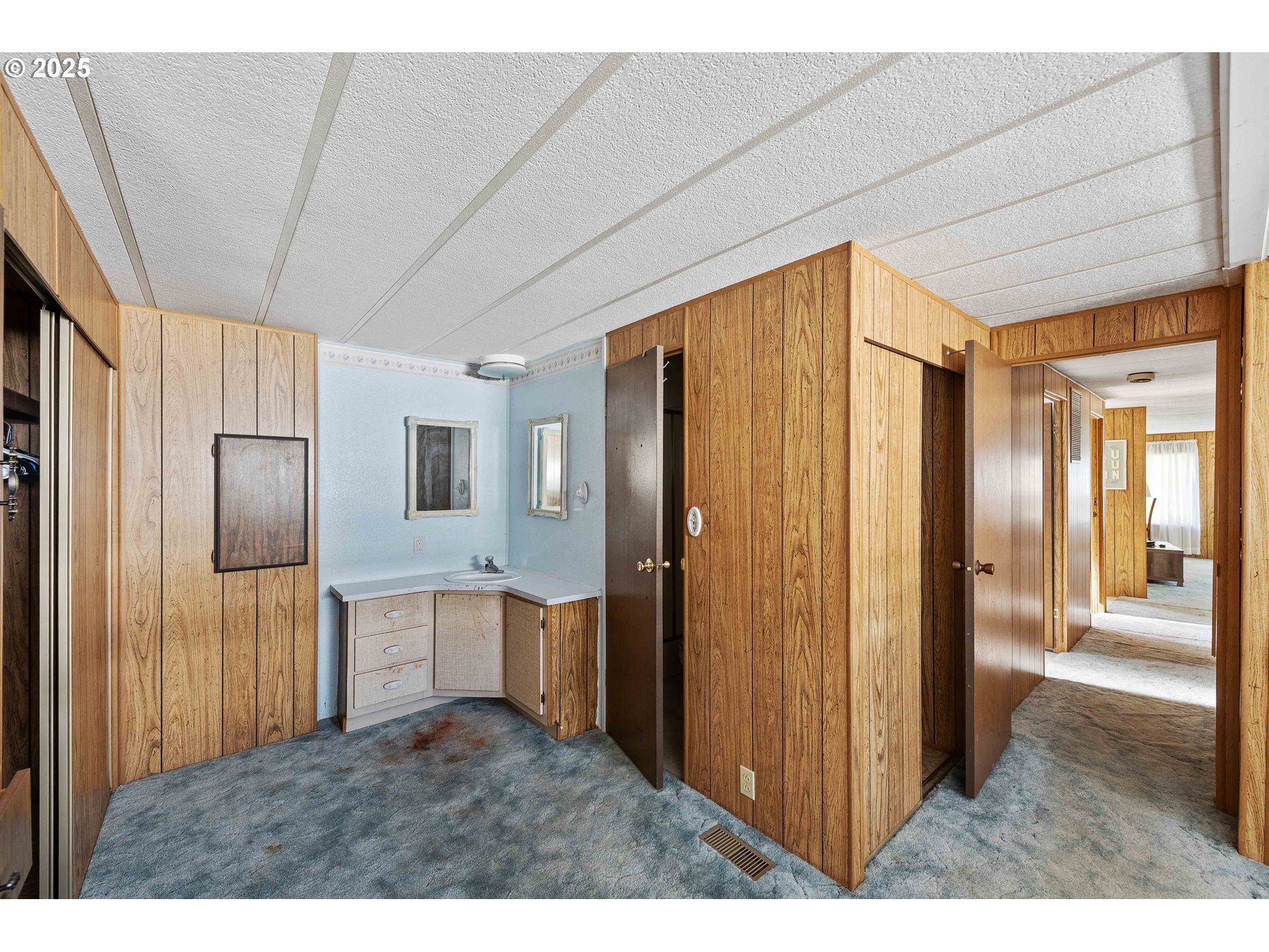1413 Hawthorne Avenue, Unit 31 Reedsport, OR 97467 - Photo 10 of 16 a kitchen with stainless steel appliances a refrigerator and a sink