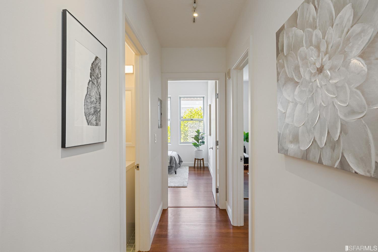 741 Clement Street, Unit 202 San Francisco, CA 94118 - Photo 11 of 23 a view of a hallway with interior of the house