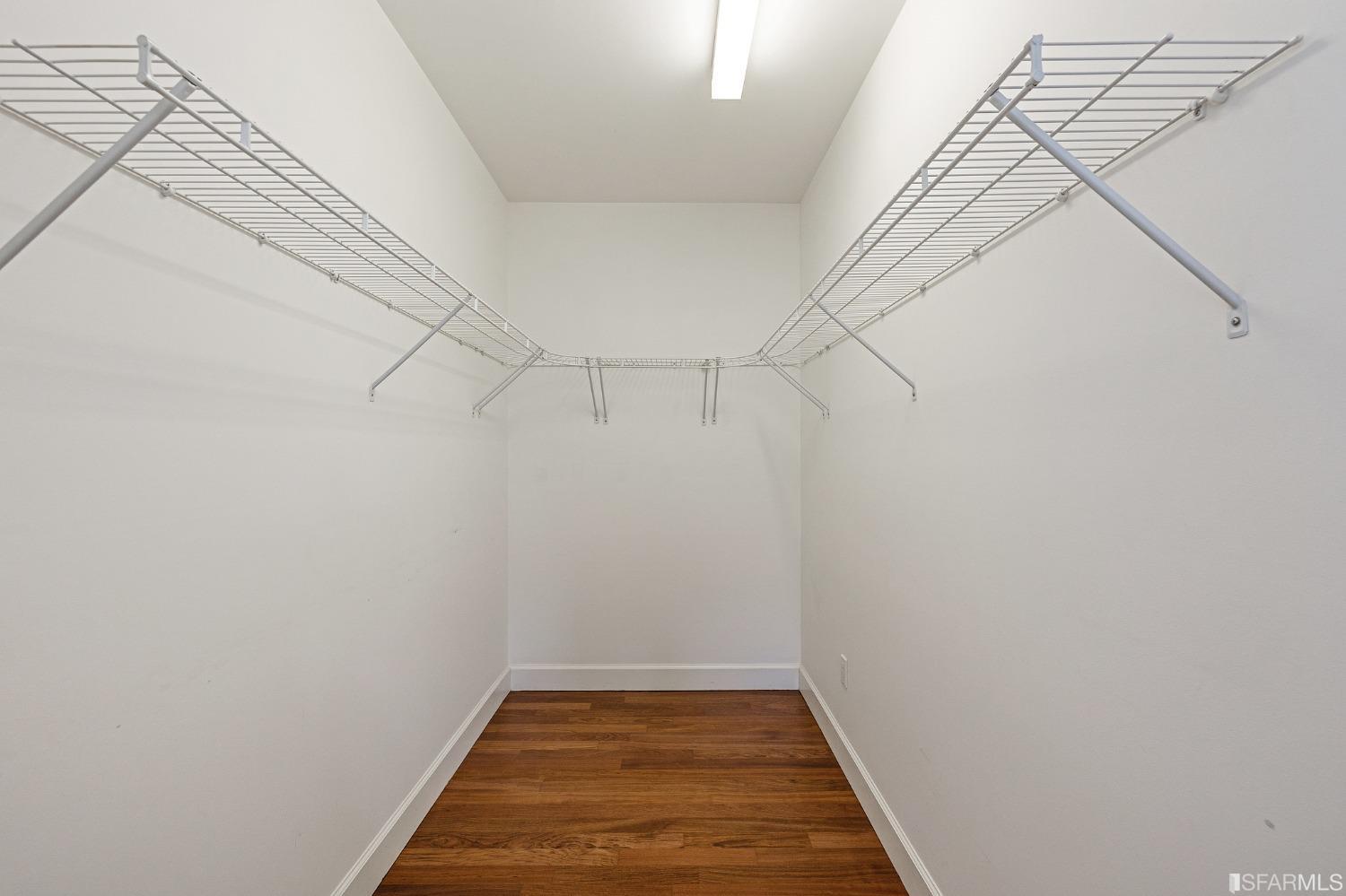 741 Clement Street, Unit 202 San Francisco, CA 94118 - Photo 13 of 23 a view of a room with racks on the wall