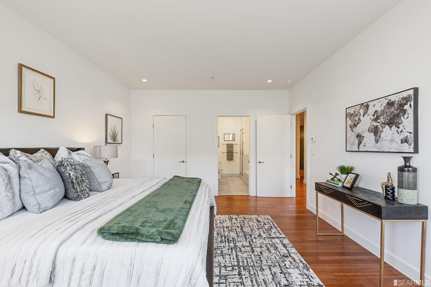 741 Clement Street, Unit 202 San Francisco, CA 94118 - Photo 15 of 23 a bedroom with a bed and a rug