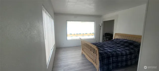 a kitchen with a refrigerator a stove top oven a sink and dishwasher