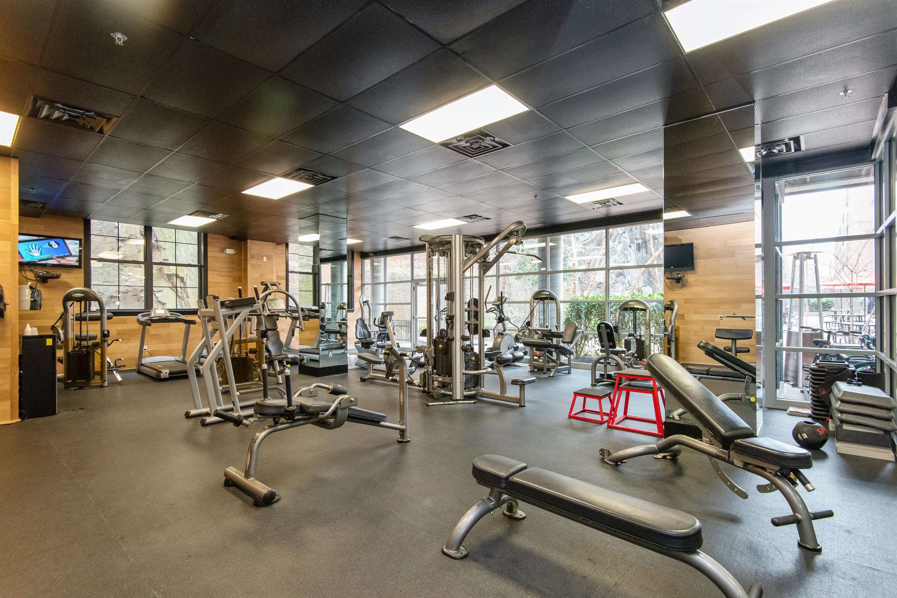 100 Paterson Plank Road, Unit 504 Jersey City, NJ 07307 - Photo 21 of 23 a view of a room with gym equipment