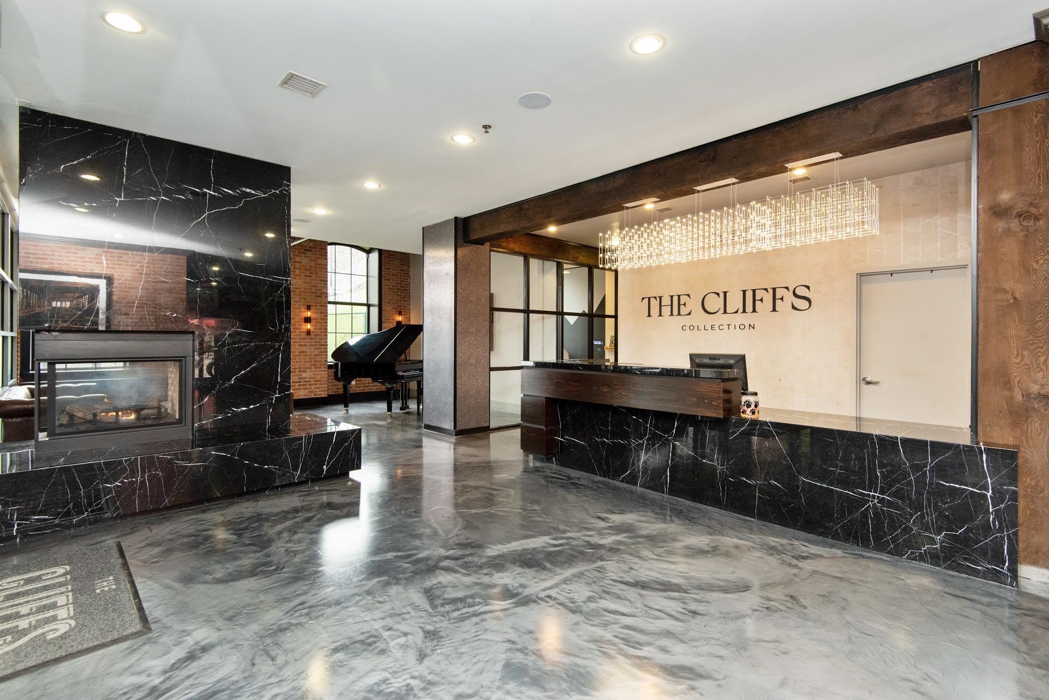 100 Paterson Plank Road, Unit 504 Jersey City, NJ 07307 - Photo 22 of 23 a lobby with furniture and a potted plant