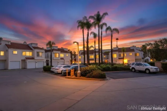 a view of a parked cars in front of a building