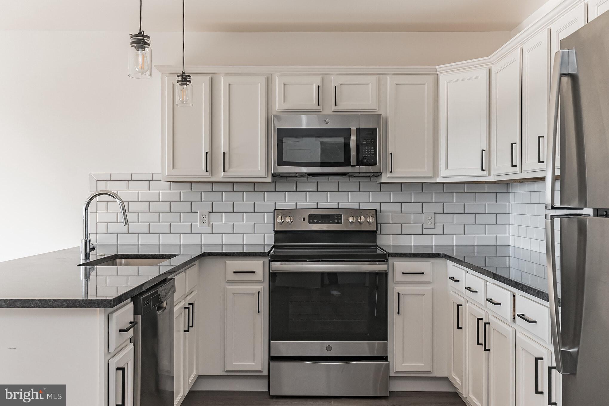 6649 Ridge Avenue, Unit A218 Philadelphia, PA 19128 - Photo 2 of 9